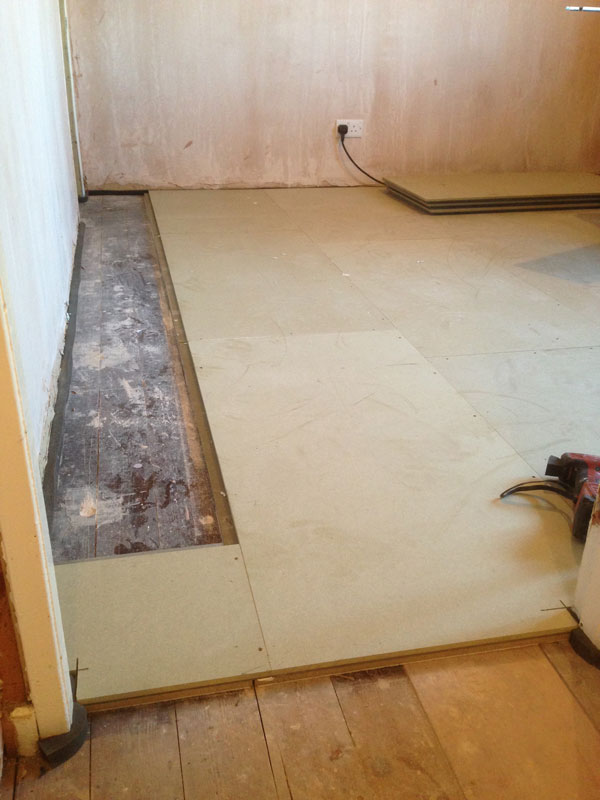 Stage 7: Installing acoustic overlay floor
